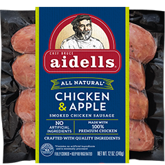 Aidells All Natural Chicken & Apple smoked sausage package with blue label, chef illustration, and sliced chicken sausage links visible behind